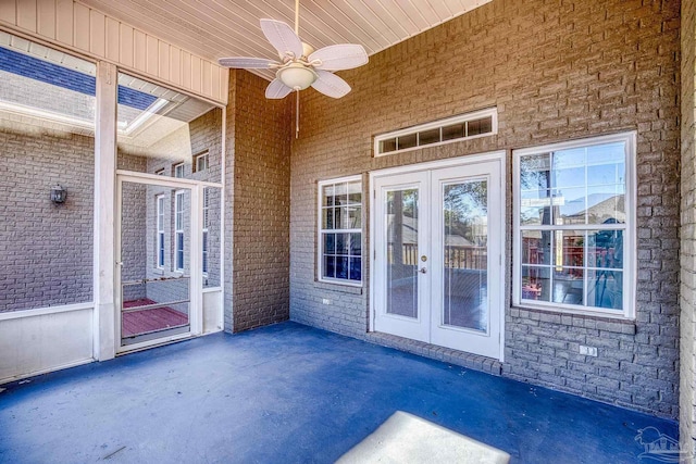 view of patio with ceiling fan and french doors