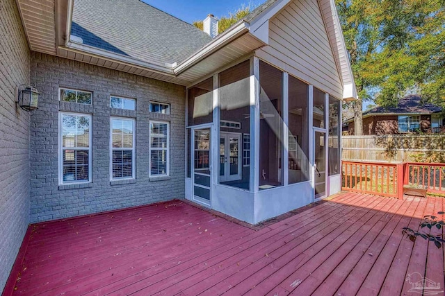 deck featuring a sunroom