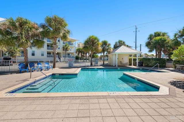 view of pool featuring a patio