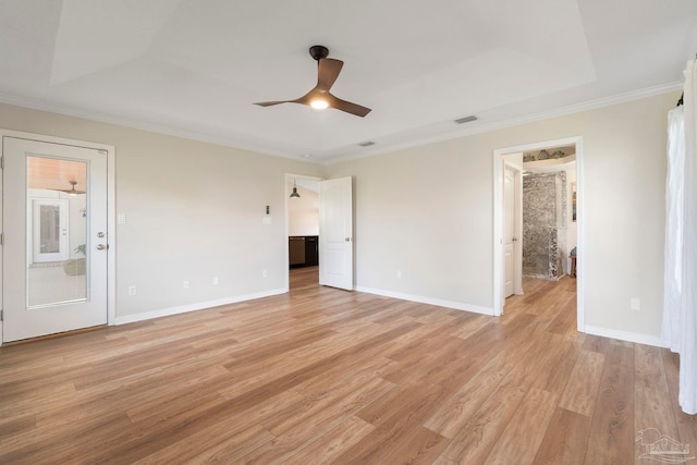 420 Palm Lake Dr, Pensacola, FL 32507 - unfurnished bedroom featuring light wood finished floors, baseboards, ornamental molding, ensuite bath, and a ceiling fan