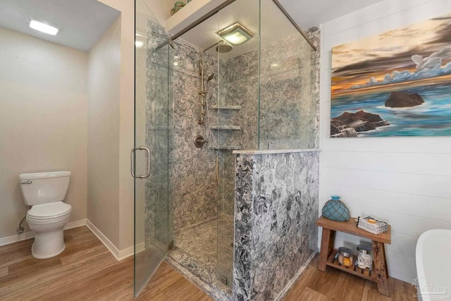 420 Palm Lake Dr, Pensacola, FL 32507 - full bath with toilet, a shower stall, wood finished floors, and baseboards