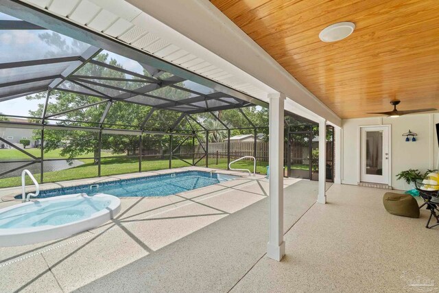 420 Palm Lake Dr, Pensacola, FL 32507 - view of swimming pool with a patio area, ceiling fan, and glass enclosure