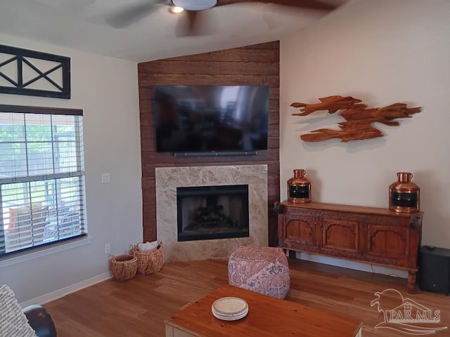 420 Palm Lake Dr, Pensacola, FL 32507 - living room with wood finished floors, ceiling fan, a high end fireplace, baseboards, and vaulted ceiling