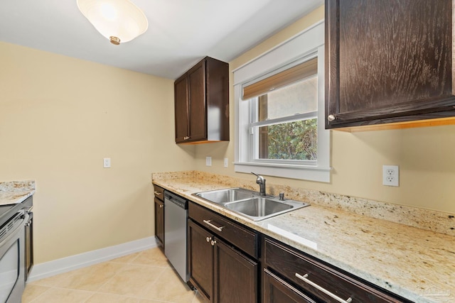 kitchen featuring light tile patterned floors, baseboards, stainless steel appliances, dark brown cabinets, and a sink