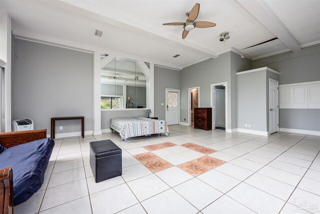 tiled bedroom featuring beam ceiling and ceiling fan