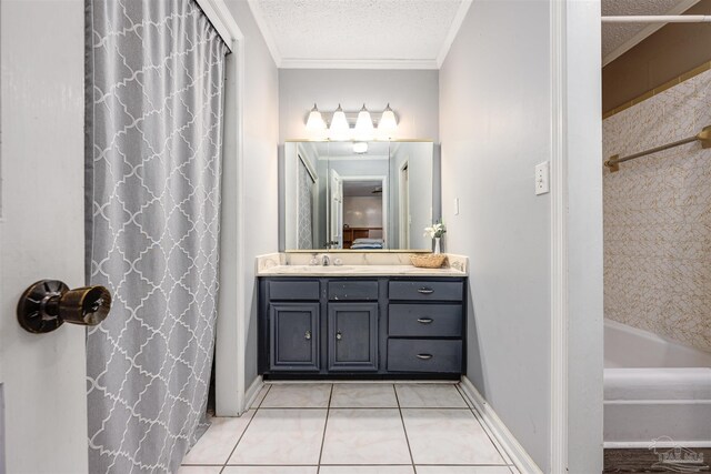 bathroom featuring tile patterned floors, crown molding, vanity, and a textured ceiling