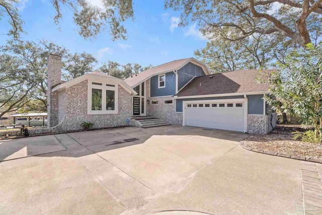 front of property with a garage