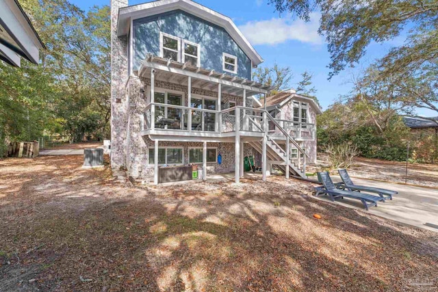 view of front of house with a pergola