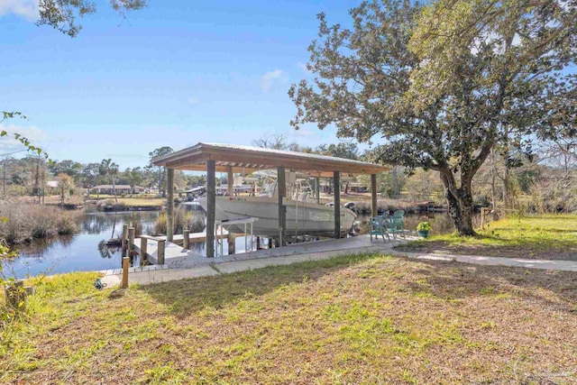 dock area featuring a yard and a water view