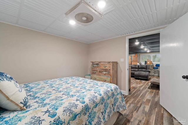 bedroom with wood-type flooring