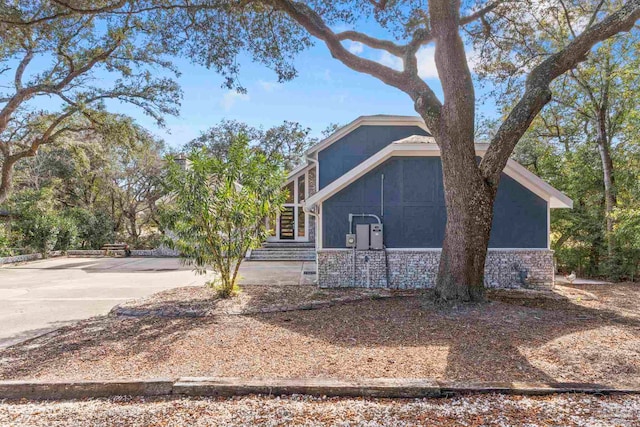 view of front of property featuring a sunroom