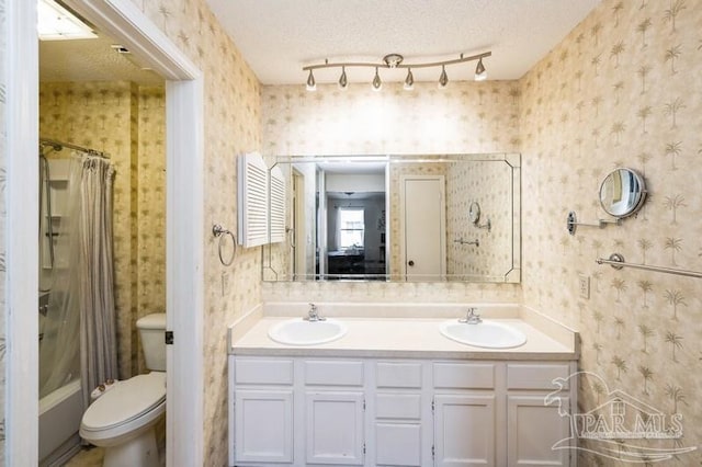 2299 Scenic Hwy Unit T7, Pensacola, FL 32503 - full bathroom with wallpapered walls, double vanity, toilet, and shower / tub combo