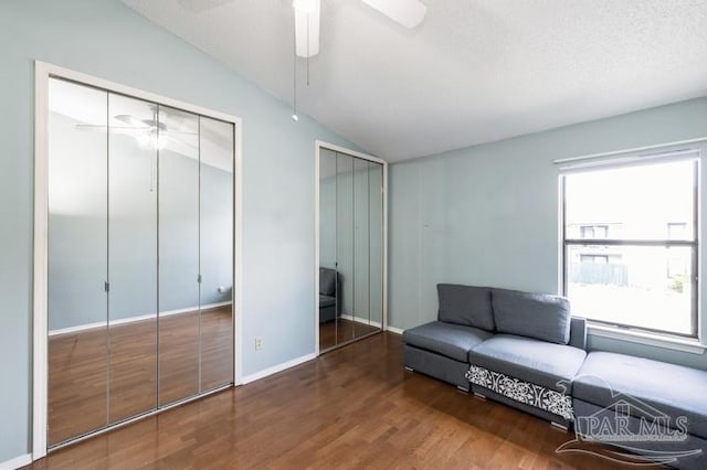 2299 Scenic Hwy Unit T7, Pensacola, FL 32503 - living area featuring a ceiling fan, lofted ceiling, wood finished floors, and baseboards