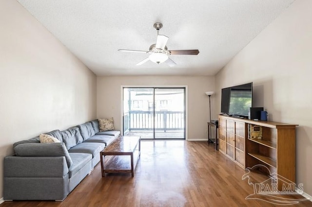 2299 Scenic Hwy Unit T7, Pensacola, FL 32503 - living room with wood finished floors, a ceiling fan, and baseboards