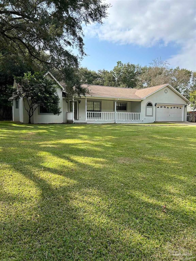 ranch-style house with a front lawn, a porch, and a garage