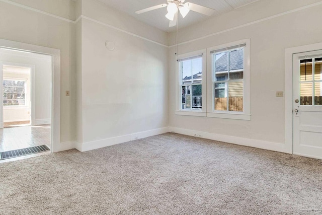 carpeted empty room with ceiling fan