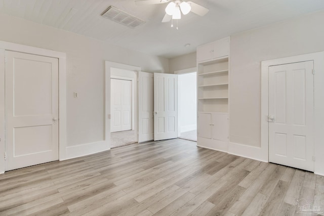 unfurnished bedroom with light hardwood / wood-style floors and ceiling fan