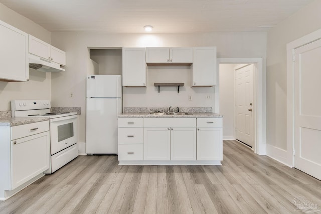 kitchen with white cabinetry, white appliances, sink, and light hardwood / wood-style flooring