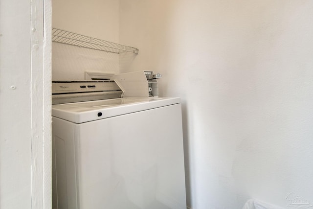 laundry area with separate washer and dryer