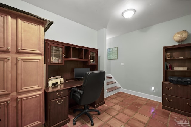 office featuring tile patterned floors and baseboards
