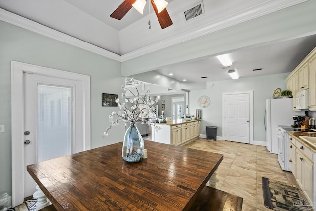 dining area with ceiling fan and visible vents