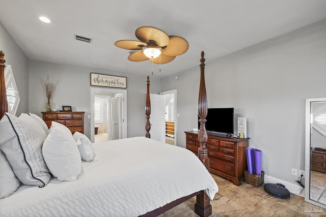 bedroom with visible vents, baseboards, a ceiling fan, and connected bathroom
