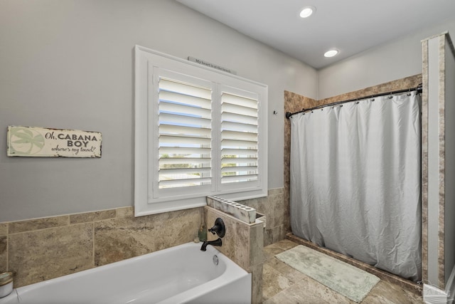 bathroom featuring a bath, recessed lighting, and a shower with curtain