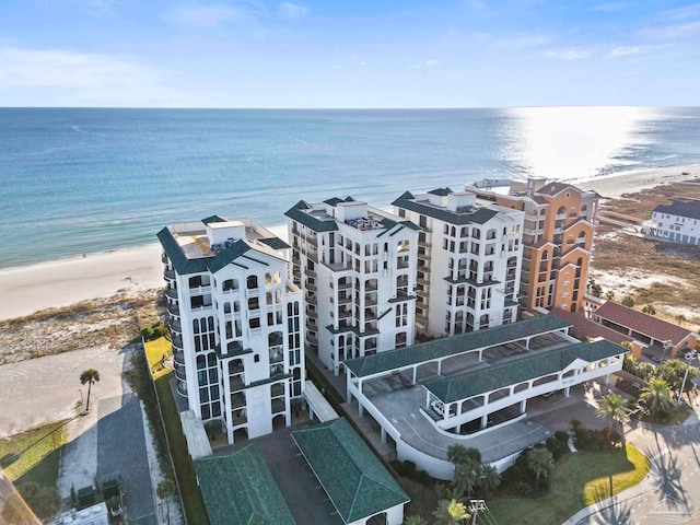 bird's eye view with a beach view and a water view