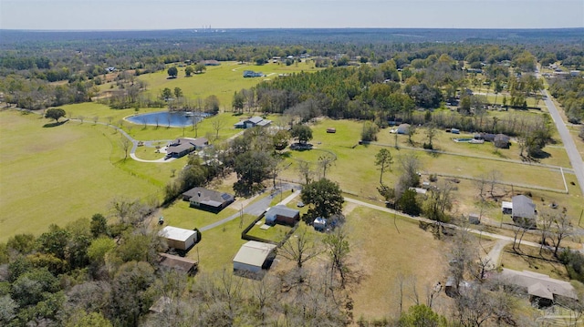 birds eye view of property featuring a rural view and a water view