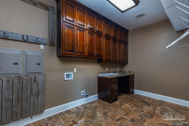 4513 River Ranch Rd, Milton, FL 32583 - laundry room with washer hookup, hookup for an electric dryer, cabinet space, and electric panel