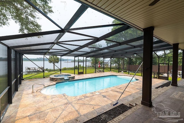4513 River Ranch Rd, Milton, FL 32583 - view of swimming pool featuring a water view, a patio, and a pool with connected hot tub