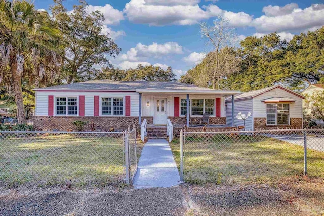 ranch-style house with a front lawn