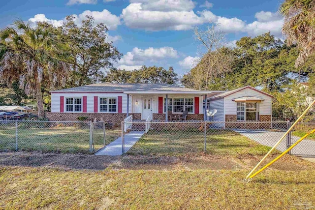 ranch-style house featuring a front lawn