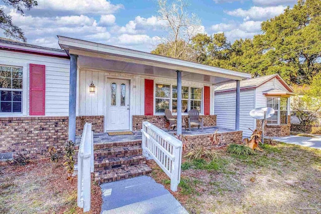 view of front of home featuring covered porch