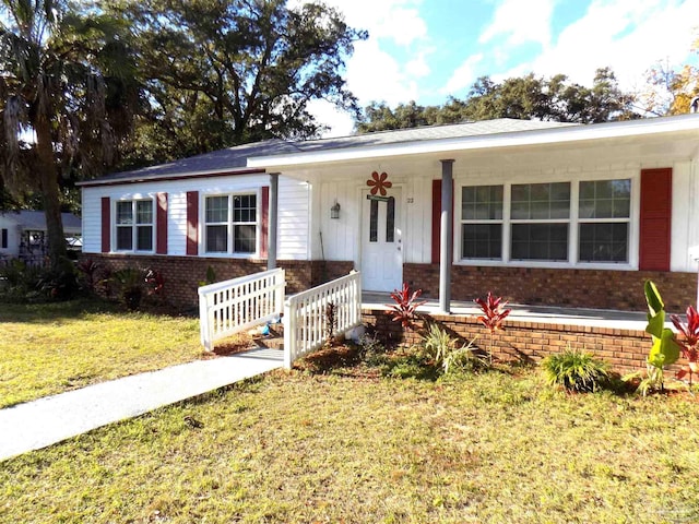 view of front of home with a front lawn