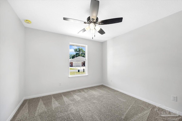 6914 Raburn Rd, Pensacola, FL 32526 - carpeted spare room with baseboards and ceiling fan