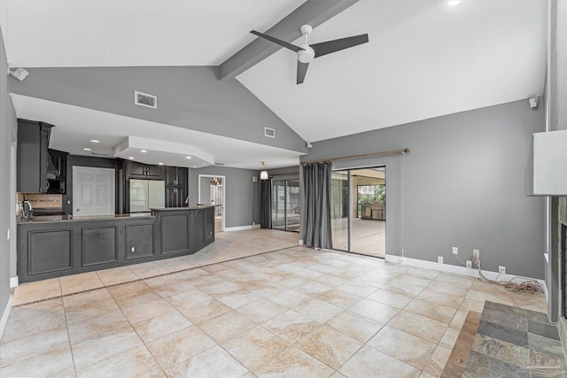 unfurnished living room featuring beam ceiling, ceiling fan, and high vaulted ceiling