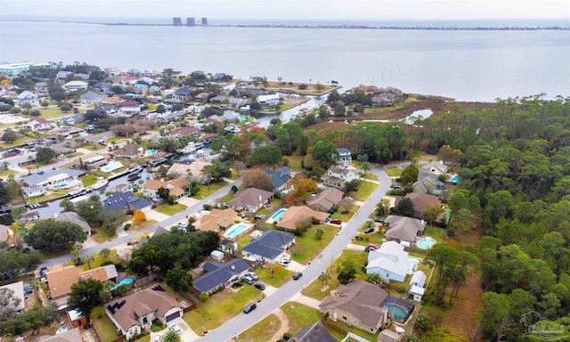 bird's eye view with a water view