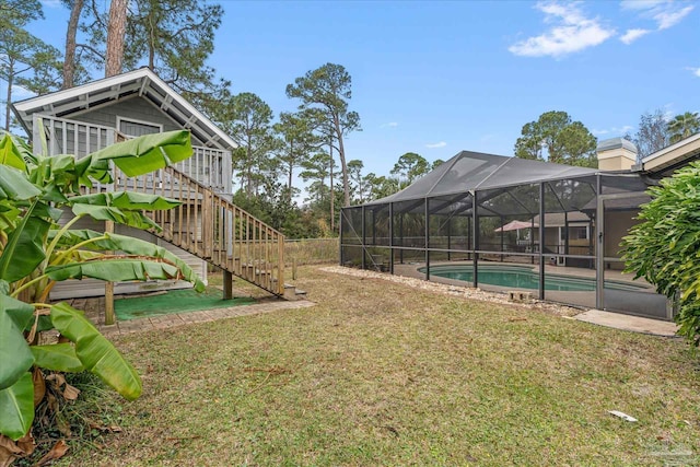 view of yard with a lanai