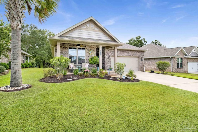 view of front of property with a porch, a garage, brick siding, driveway, and a front yard