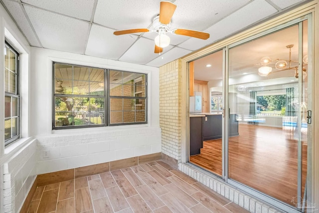 7332 Maxam Ave, Pensacola, FL 32503 - unfurnished sunroom with a paneled ceiling and ceiling fan