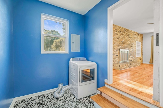 7332 Maxam Ave, Pensacola, FL 32503 - laundry area featuring washer / dryer, electric panel, and wood-type flooring