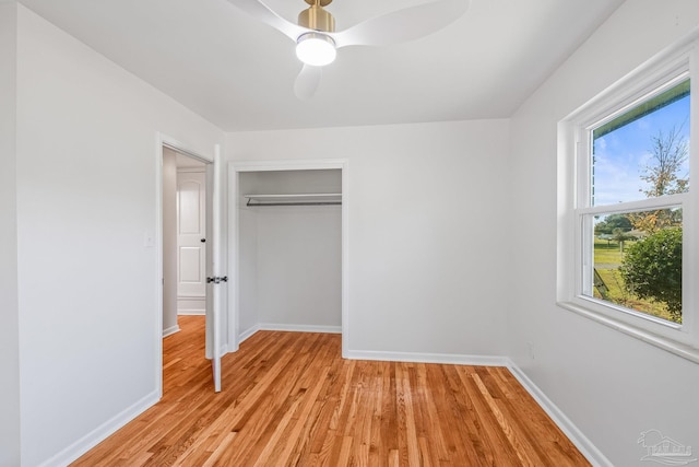 7332 Maxam Ave, Pensacola, FL 32503 - unfurnished bedroom with ceiling fan, a closet, and light wood-type flooring