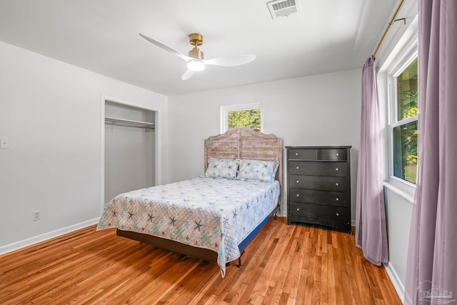 7332 Maxam Ave, Pensacola, FL 32503 - bedroom with a closet, ceiling fan, and light hardwood / wood-style flooring