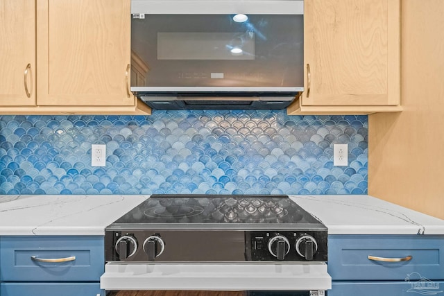 7332 Maxam Ave, Pensacola, FL 32503 - kitchen with light brown cabinets, stove, exhaust hood, light stone countertops, and tasteful backsplash