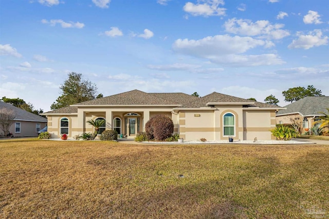 view of front of home with a front lawn