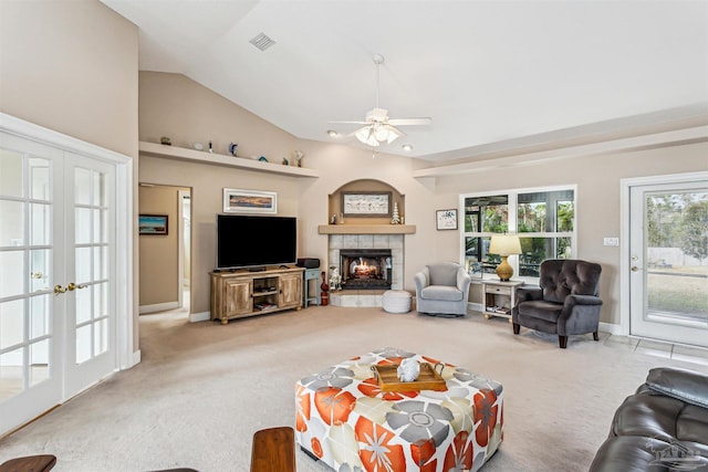 living room with french doors, carpet floors, ceiling fan, and lofted ceiling