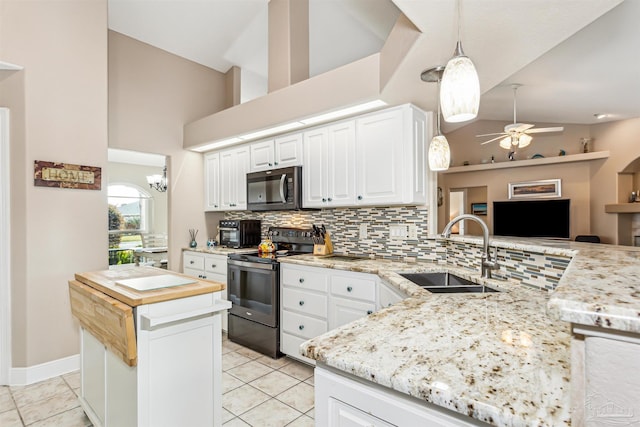 kitchen featuring white cabinets, ceiling fan, range with electric stovetop, and sink