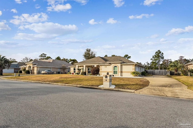 view of front of home with a front lawn