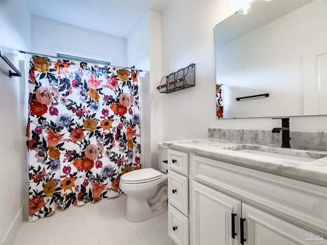 bathroom featuring vanity, walk in shower, and toilet